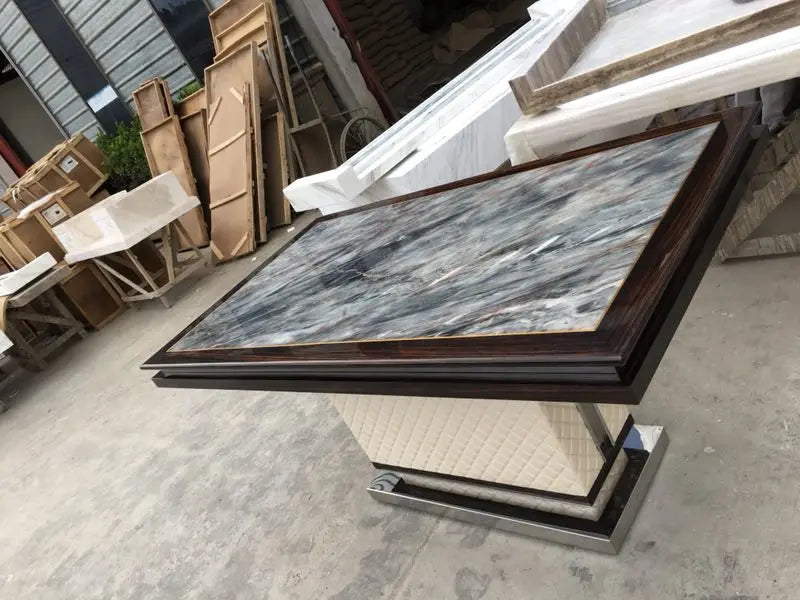 The Quilted Sovereign: Natural Marble & Eco-Leather Monolith Dining Table