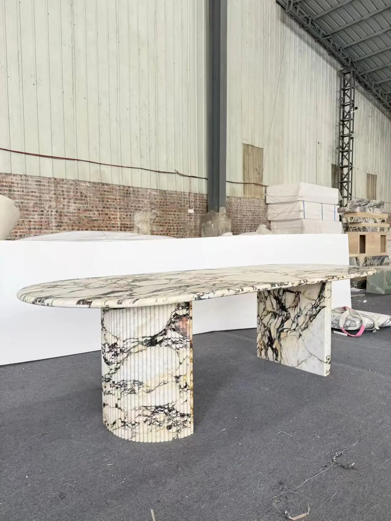 Front View: Fluted Monolithic Base of Calacatta Viola Table | LuxuryMarbleHome