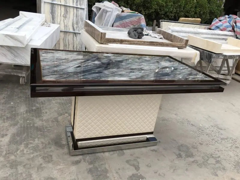 The Quilted Sovereign: Natural Marble & Eco-Leather Monolith Dining Table