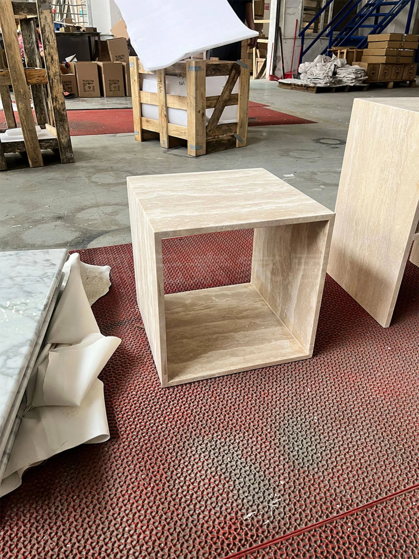 The Geometric Monolith: Roman Travertine Hollow Cube Side Table