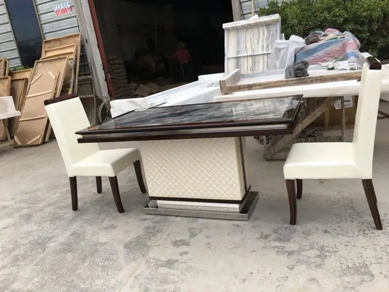 The Quilted Sovereign: Natural Marble & Eco-Leather Monolith Dining Table